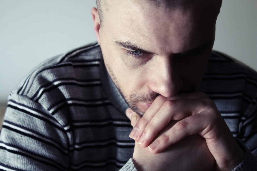 Man looking disappointed, representing how to cope with disappointment