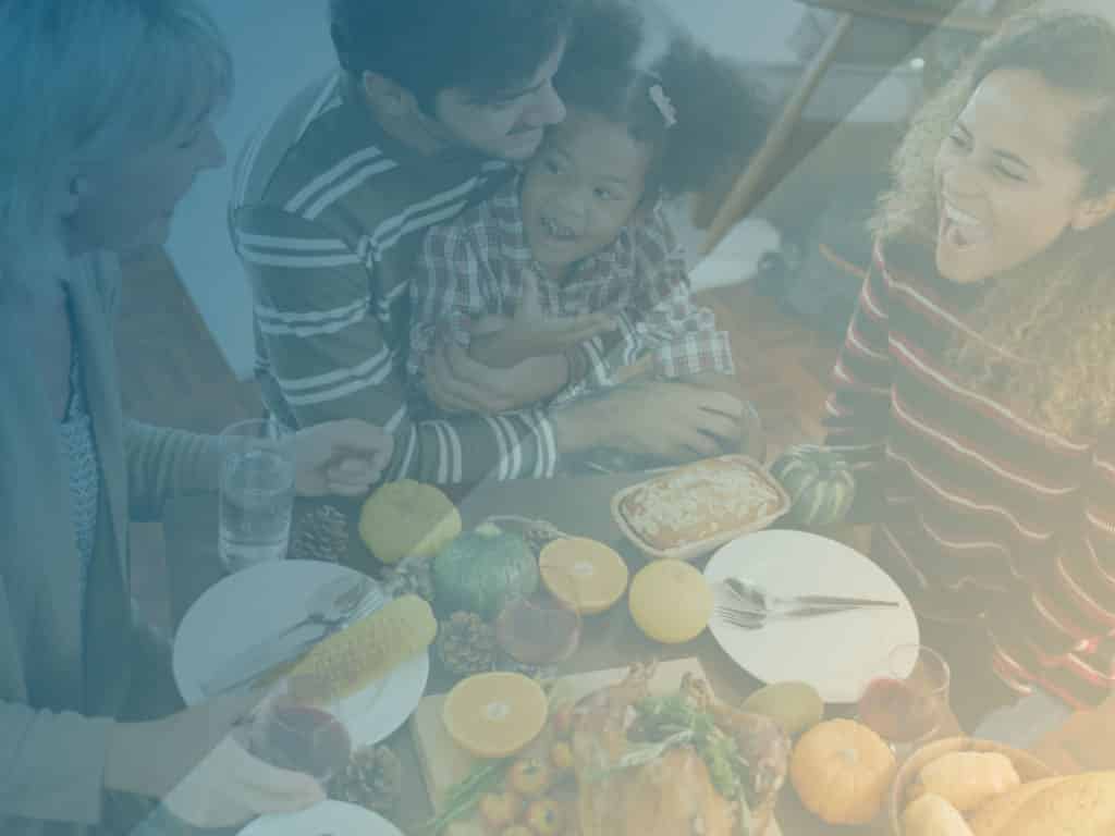 Family sitting around a table, eating representing Feeling Judged?