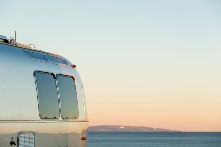 Van traveling representing The Pursuit of Happiness