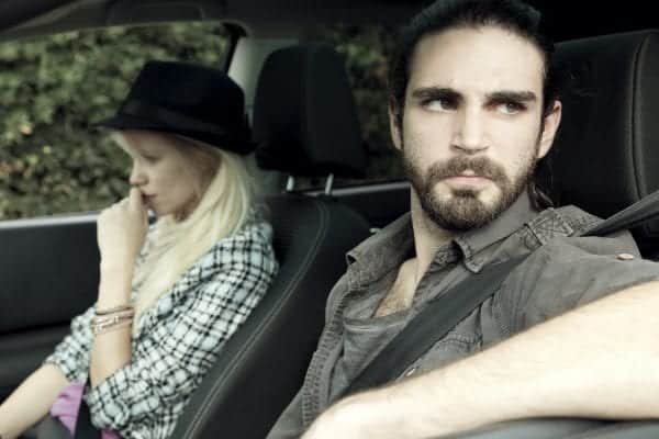Couple in a car: Man driving and staring out the window. How to recover from a Horrible Fight
