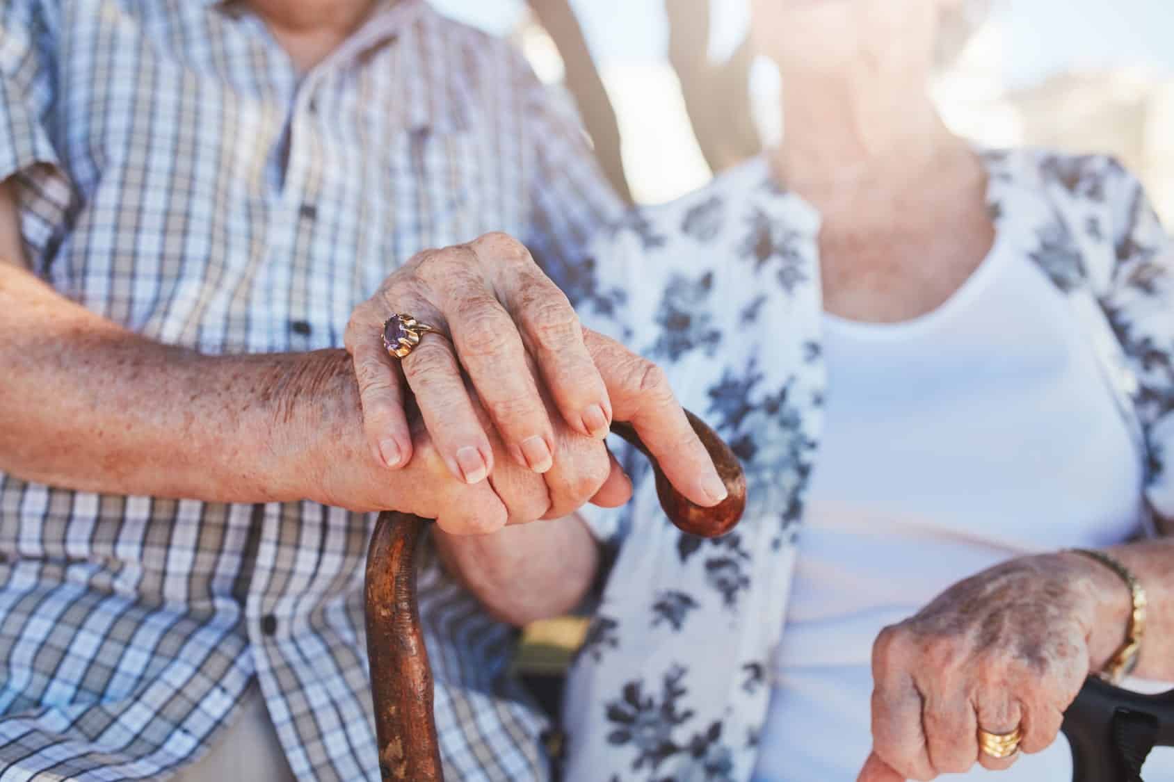 Older couple holding hands representing Will Your relationship Last a Lifetime?
