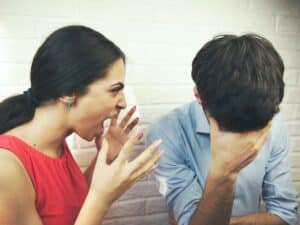 Woman screaming at man. Solve the biggest problem in your relationship: communication problems.