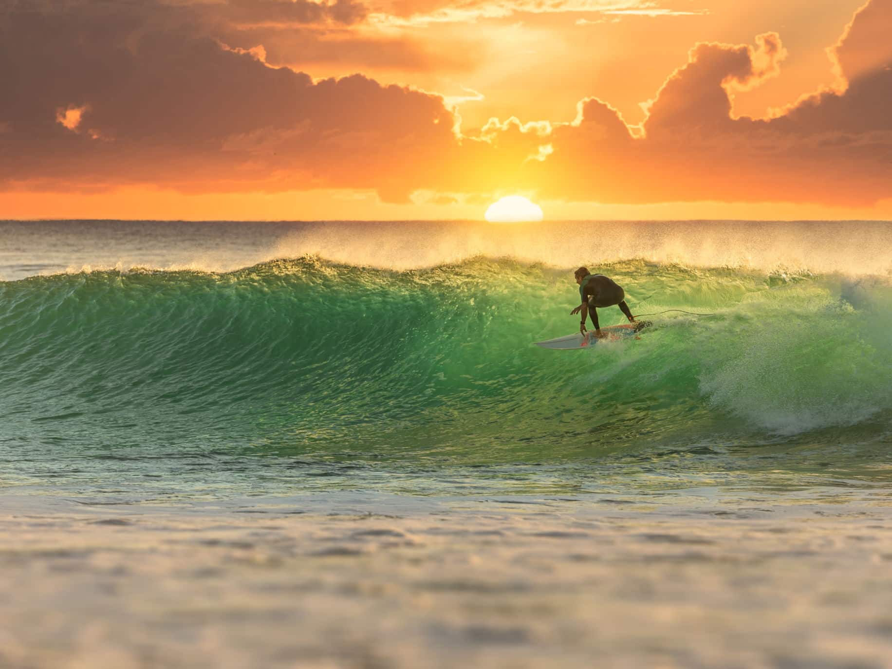 Person surfing. Becoming emotionally healthy.