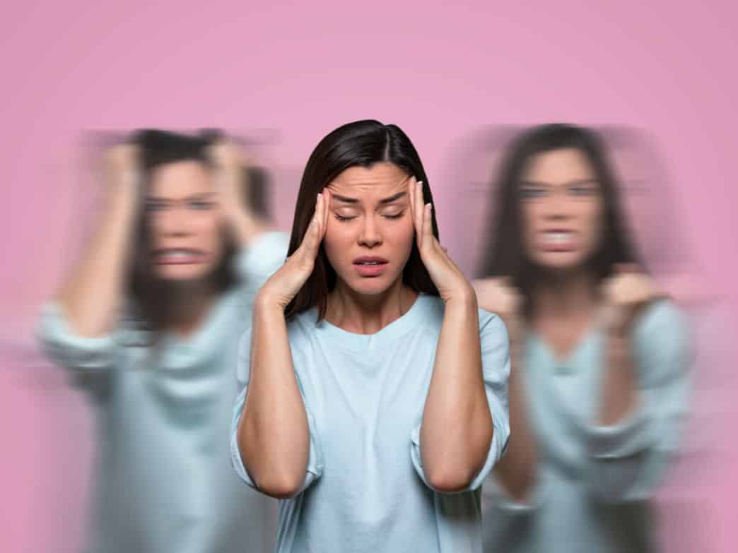 3 versions of a woman with 3 different emotions representing How to Stop Beating Yourself Up