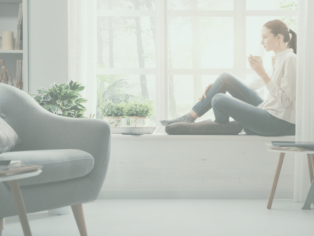 woman relaxing with a cup of coffee representing Covid Anxiety: How to Cope