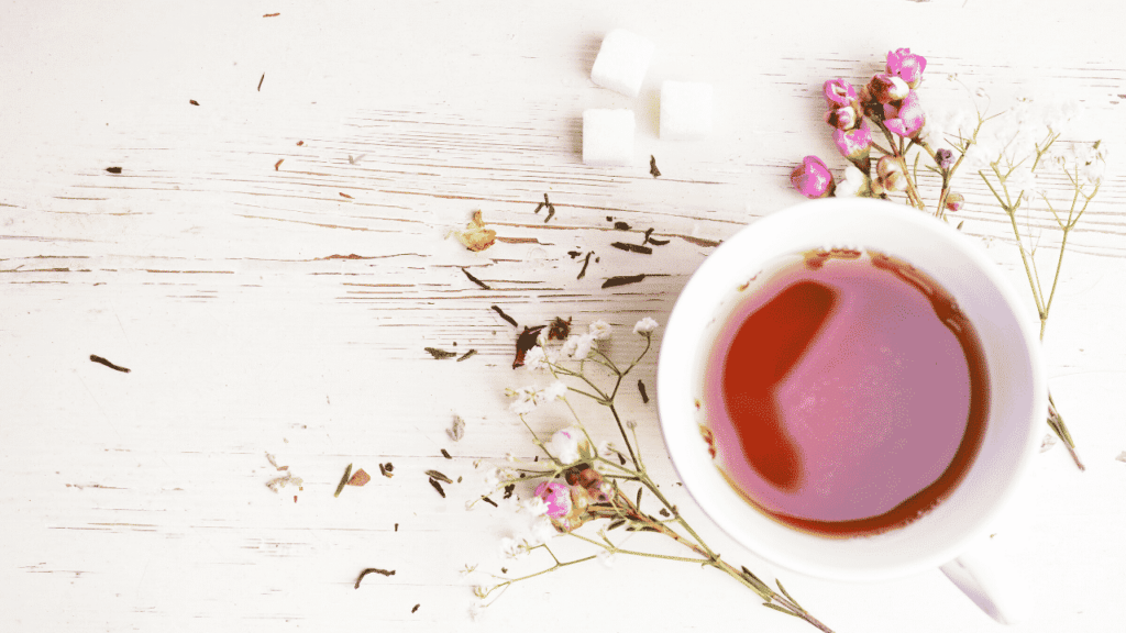 Cup of tea with flowers around it. How to stay stress free.