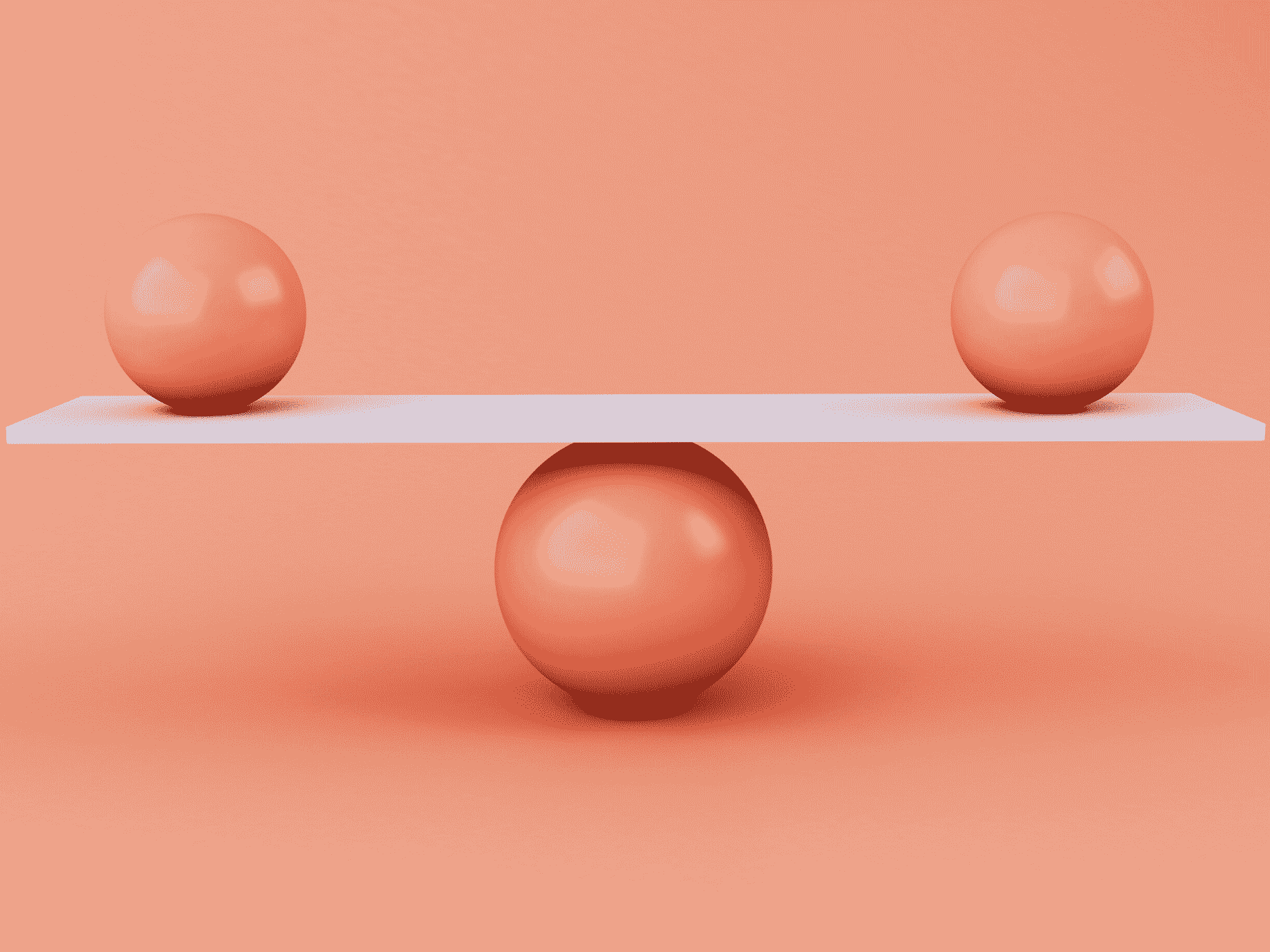 two smaller balls balancing on top of a bigger ball. finding balance.