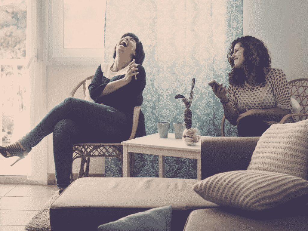Friends laughing. Importance of healthy friendships.