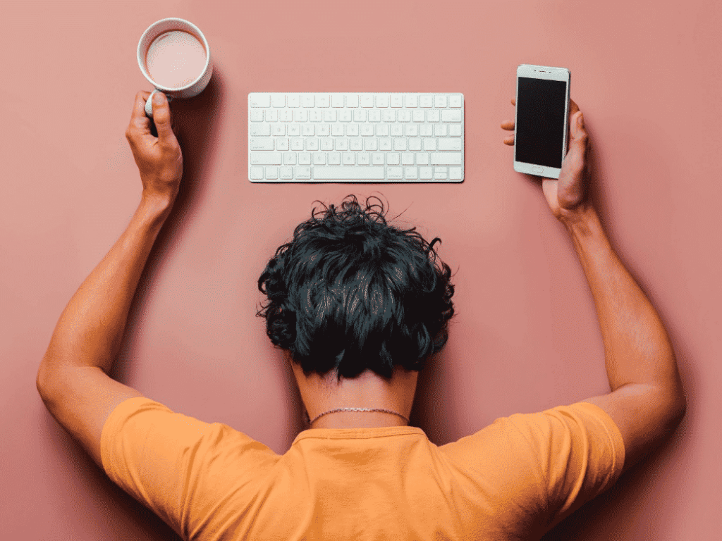 Woman with her head on the desk. Burnout Prevention and Recovery