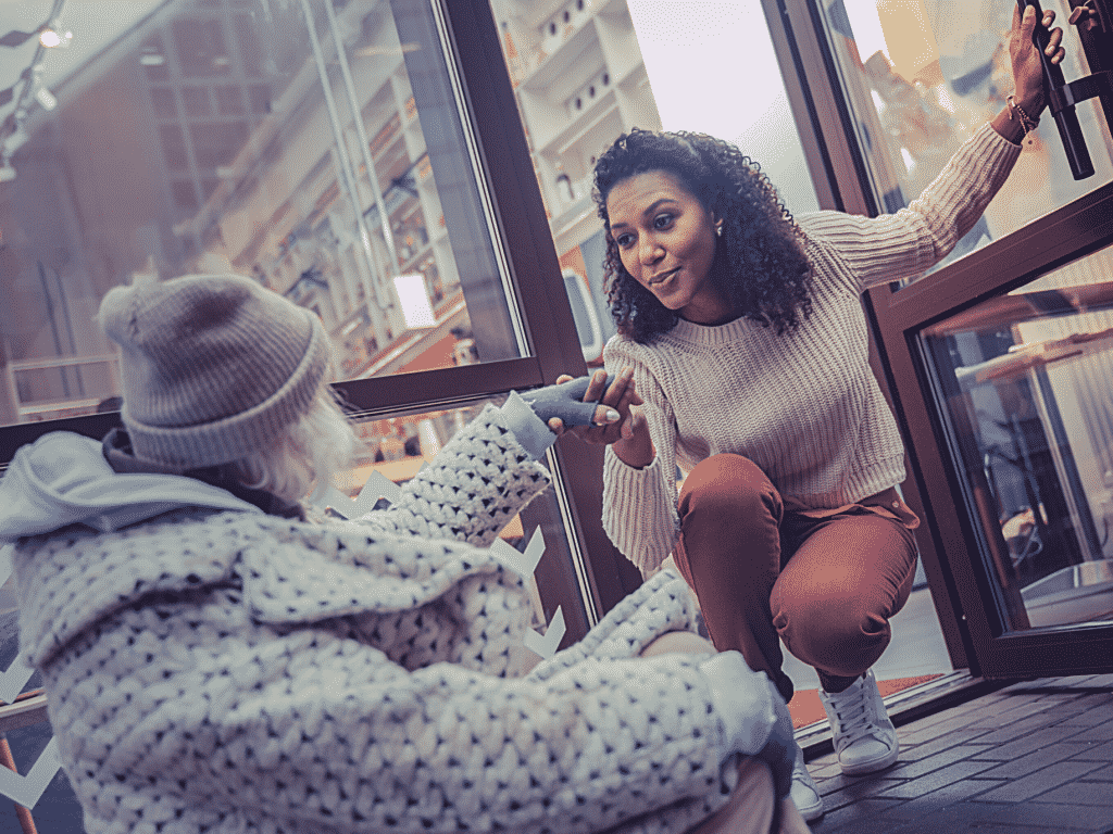 Women helping an older person representing Have Courage and Be Kind