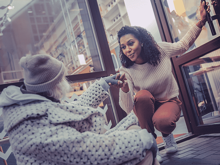 Women helping an older person representing Have Courage and Be Kind