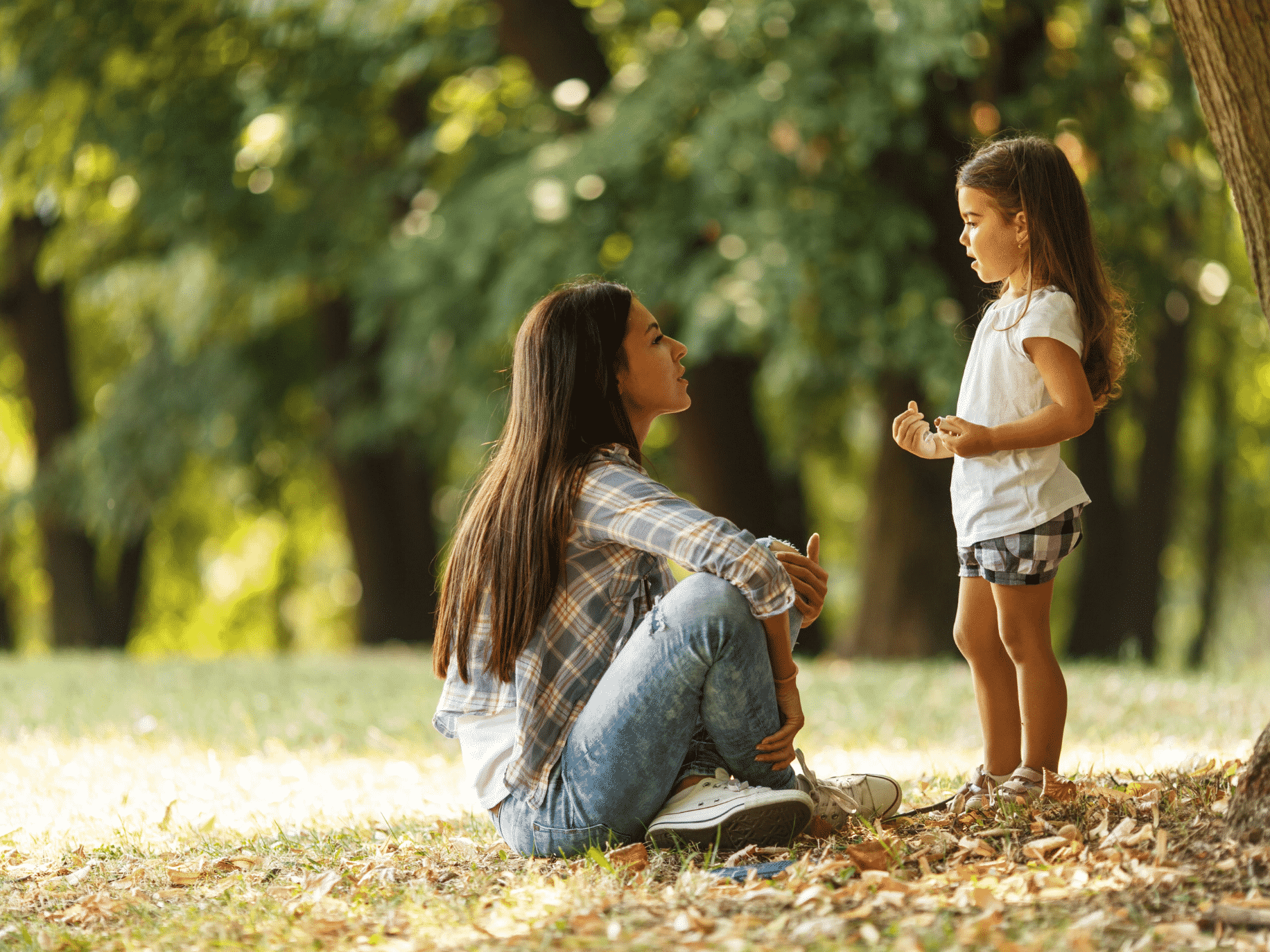 mother and daughter in park gentle parenting family therapy