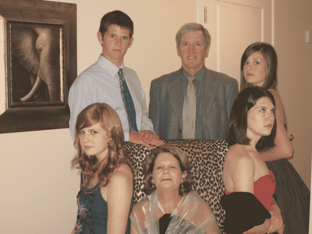 Family picture around a chair. Dysfunctional Family Roles