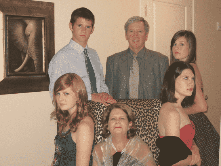 Family picture around a chair. Dysfunctional Family Roles