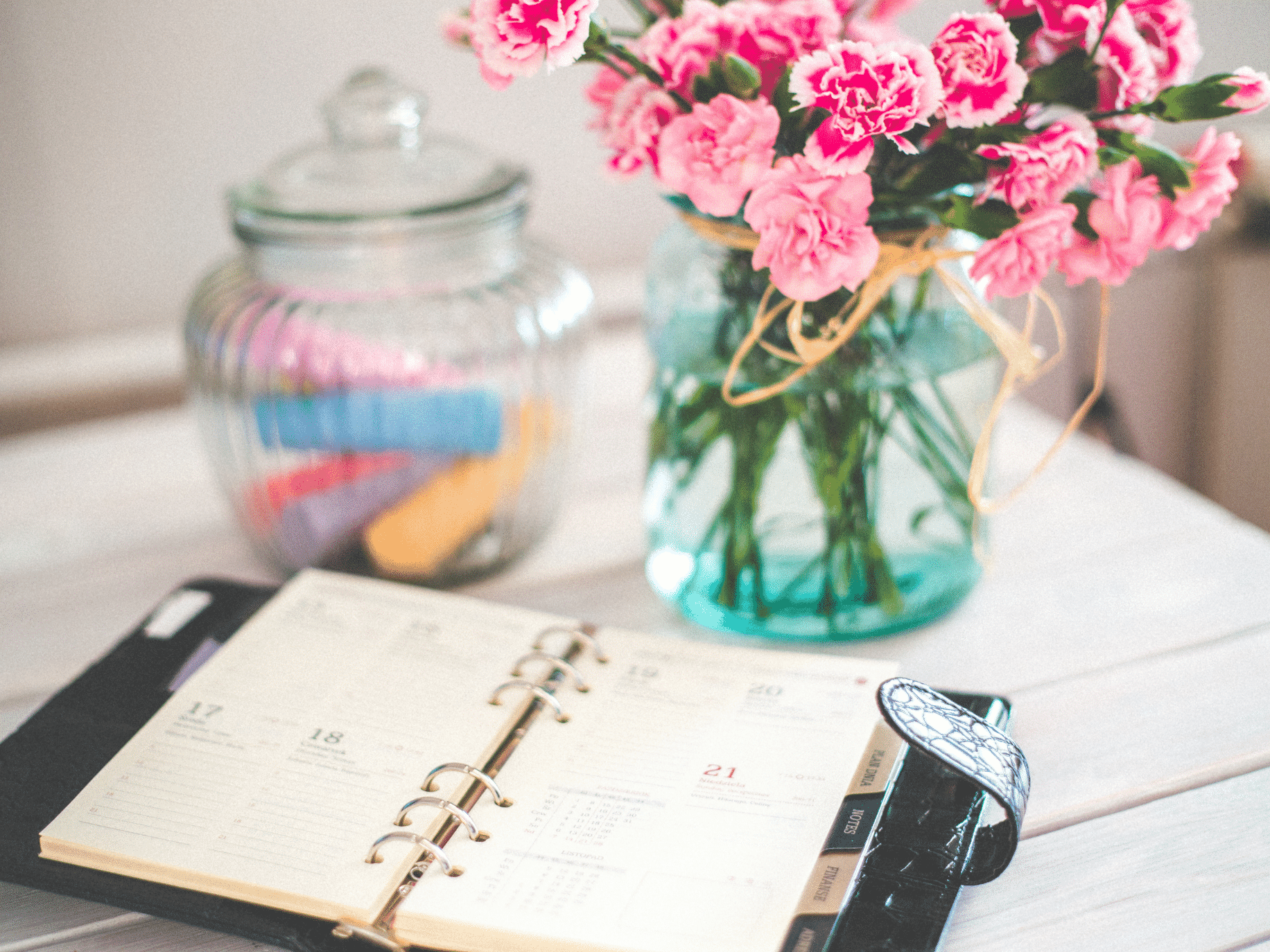 agenda on desk with flowers representing Life Design: How to Construct Your Pathway With Hope for the Future