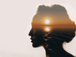 Silhouette of a woman with a beautiful sunset in the silhouette representing Trust Yourself