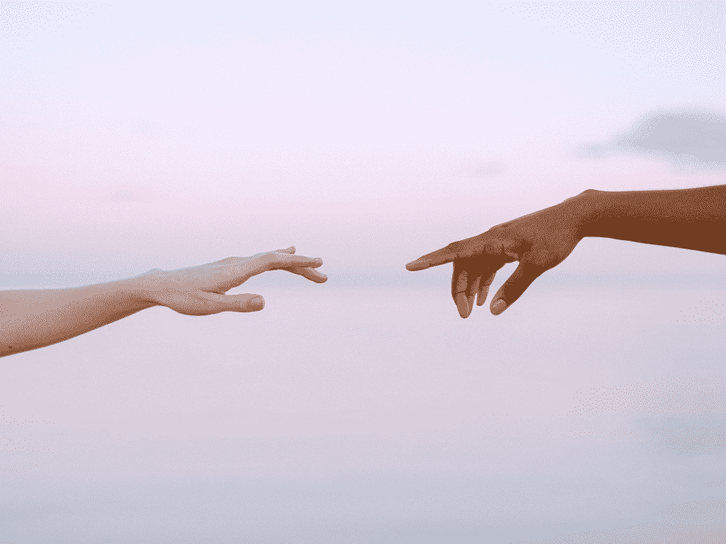 hands reaching out towards each other. What is an emotional affair?