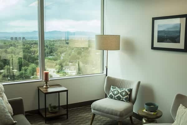 View of Denver from the window of an online life coach’s office.