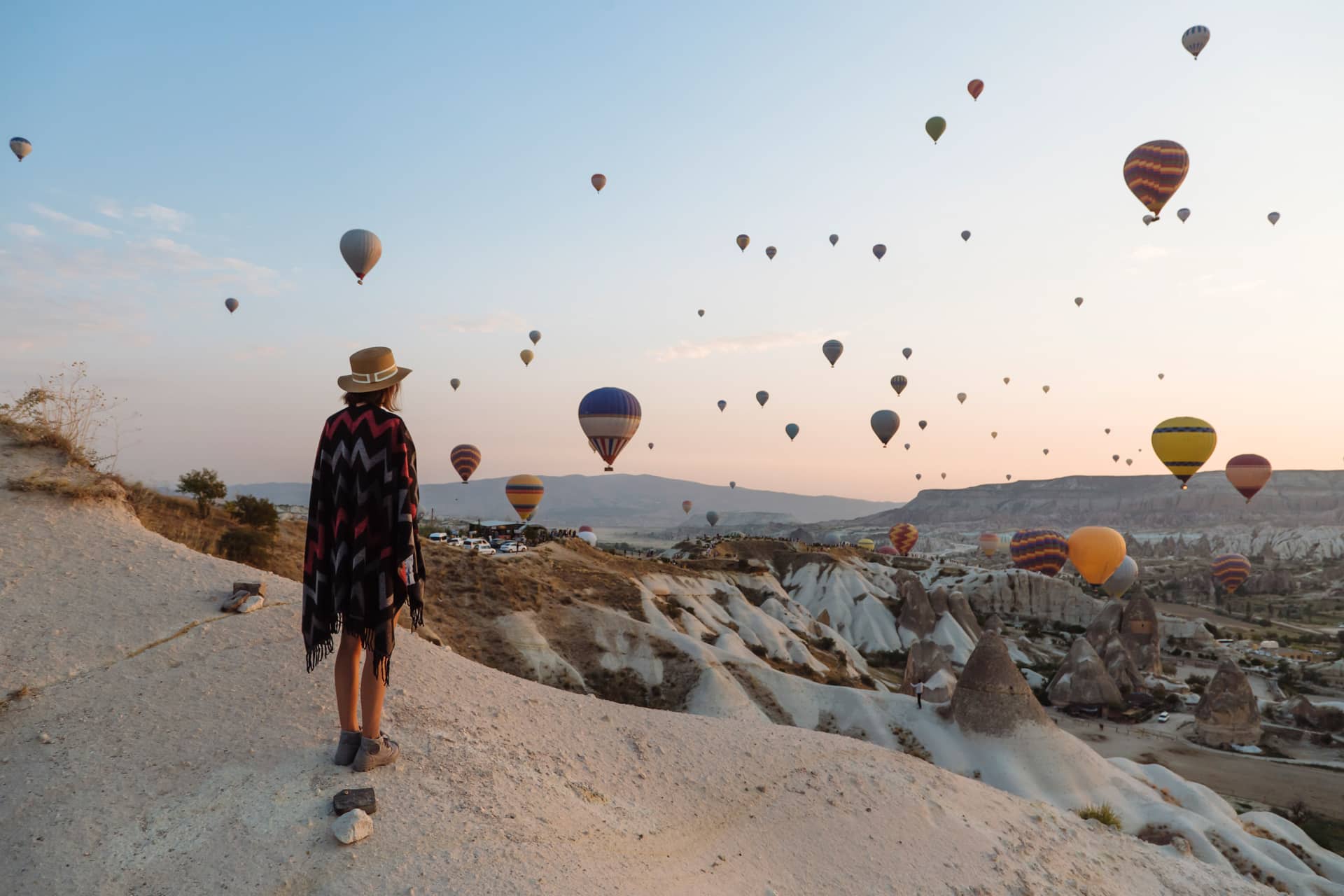 Young woman watching balloons, representing Denver career counseling for career clarity