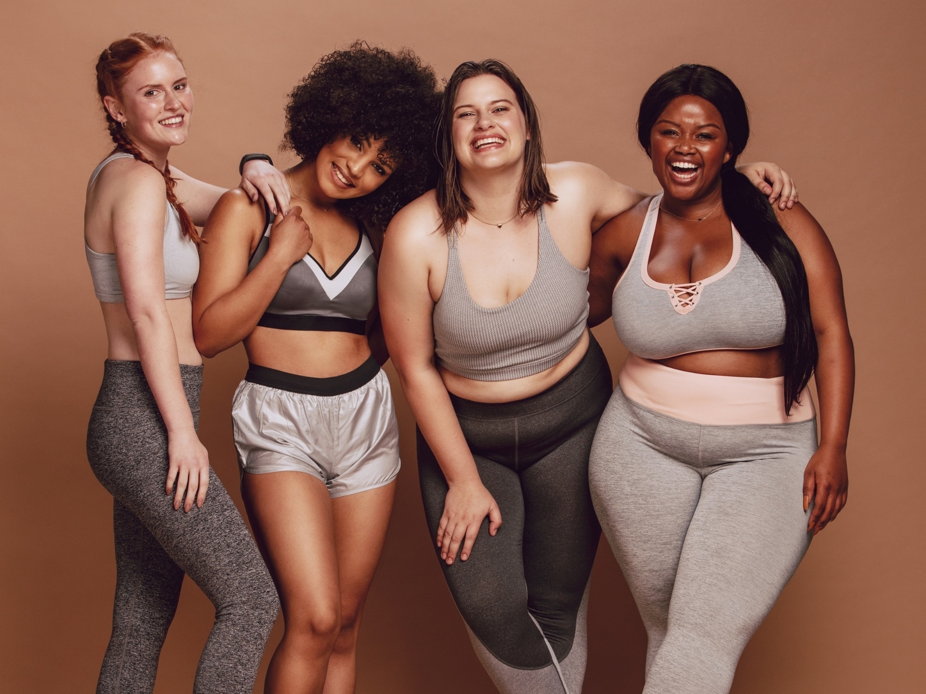 4 women embracing their bodies. Love your body.