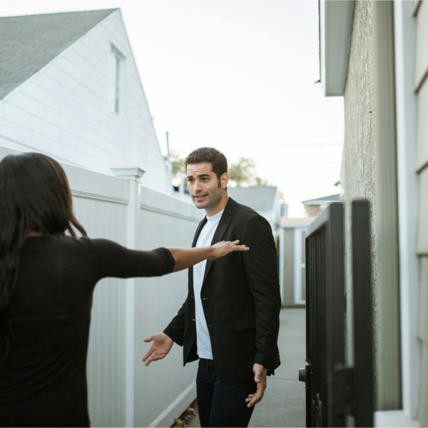 A couple argues in an alleyway representing how to avoid miscommunication in relationships