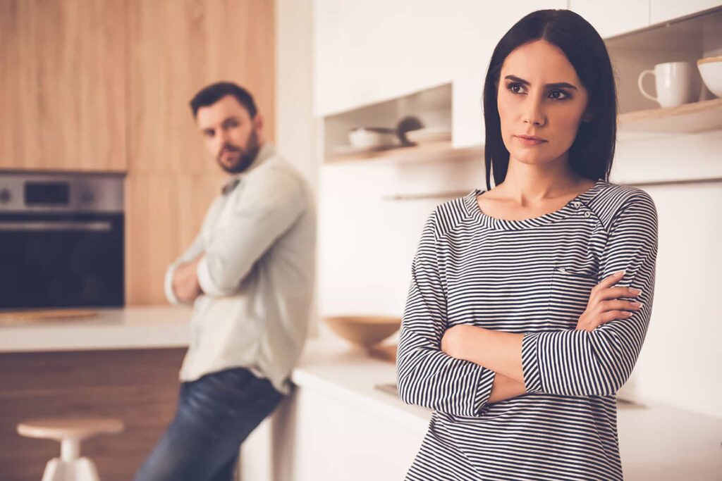 Couple standing in there kitchen after a fight Worried About Relationship