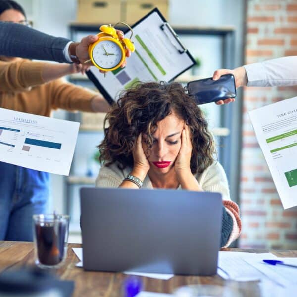 A woman stressed out at work.