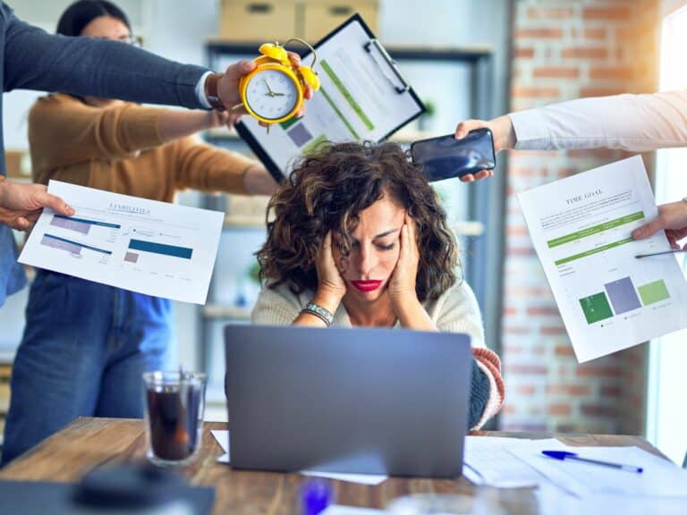 A woman stressed out at work.
