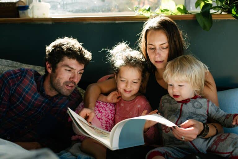 Family reading book together