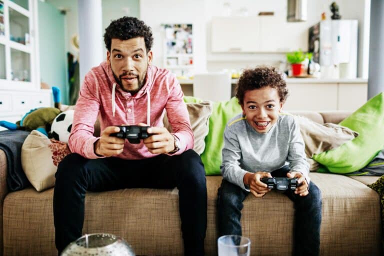 Father and son playing video games