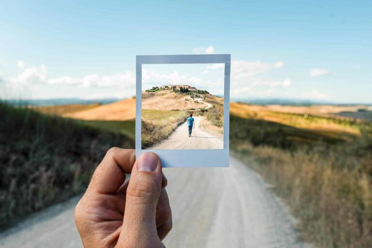 Polaroid photo of man walking in Colorado, representing career coaching services