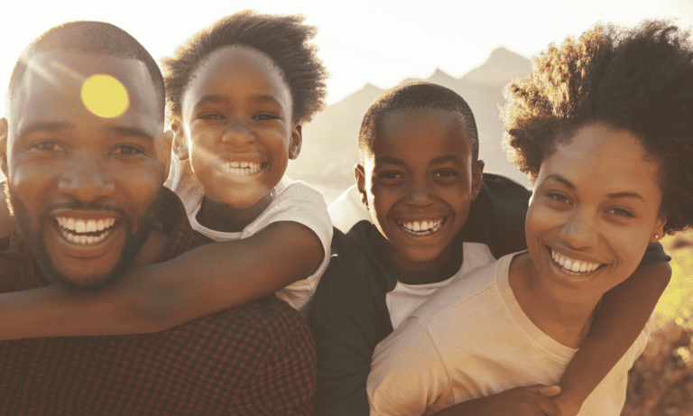 Smiling family, Fight Racism: Hope, Healing, & Empowerment