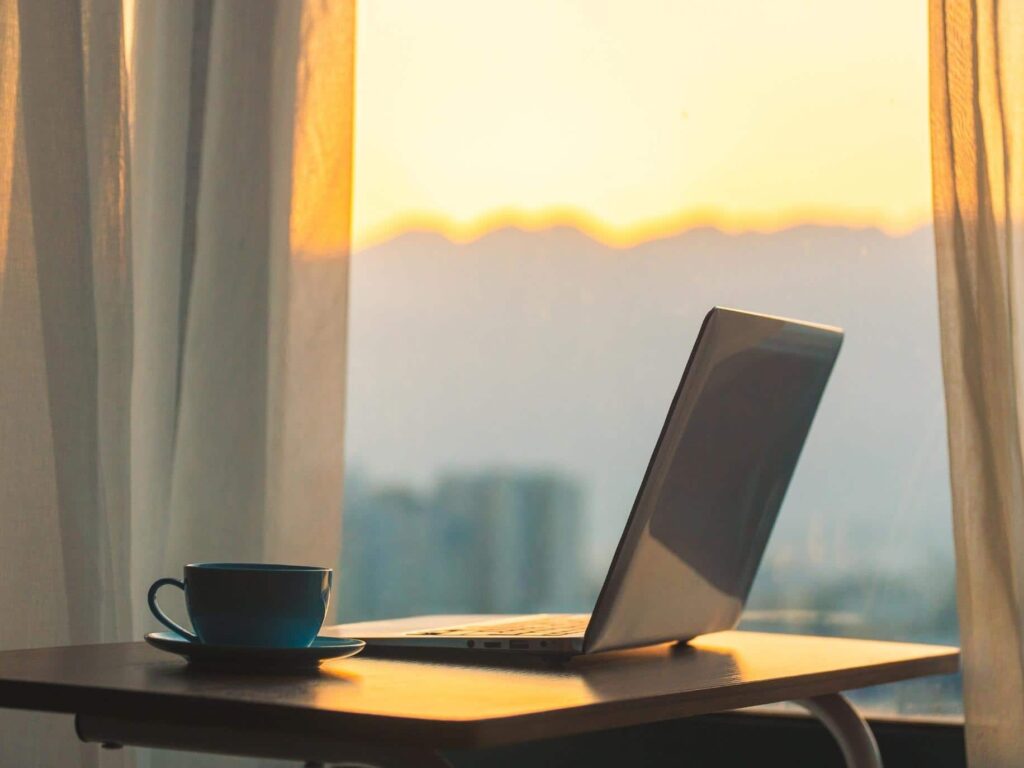 sunrise behind desk, starting a new chapter expert career coaching growing self dr lisa marie bobby with dr lisa severy
