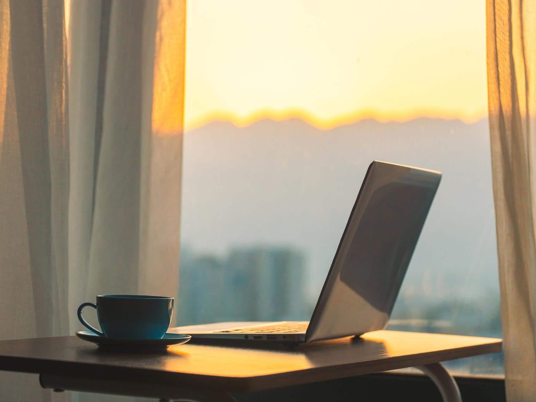 sunrise behind desk, starting a new chapter expert career coaching growing self dr lisa marie bobby with dr lisa severy