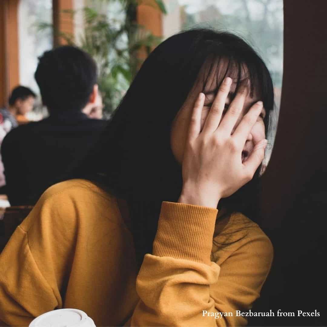 Girl giggling with a crush.