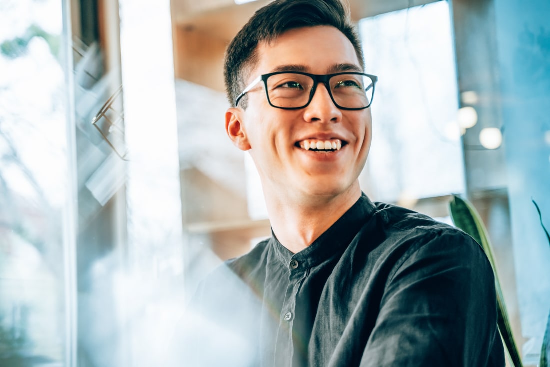 Portrait of a young man in a leadership coaching session