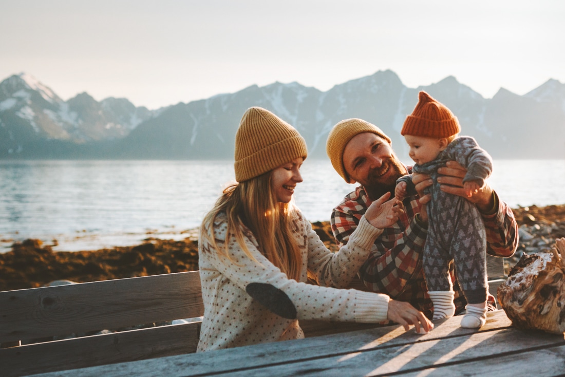 family in the mountains by a lake - emotional intelligence coaching and life coaching