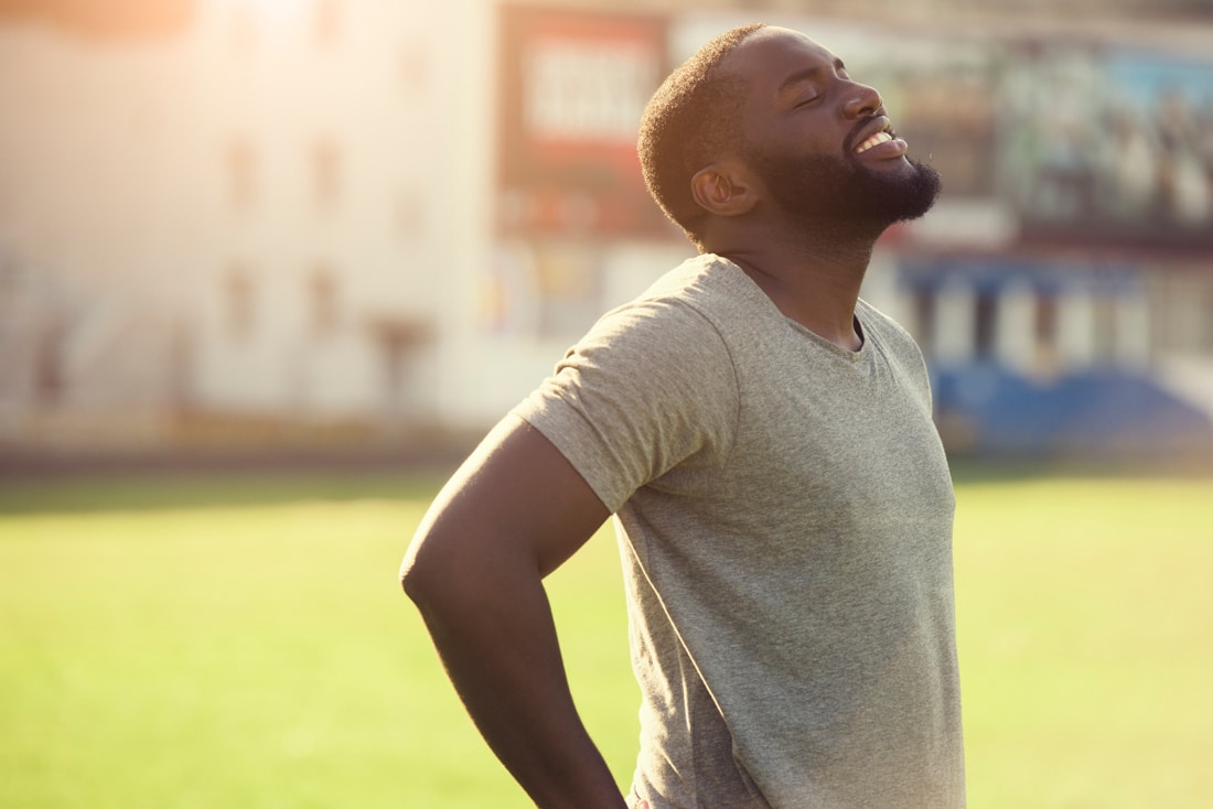 black man taking a break after running, personal growth and solution sessions