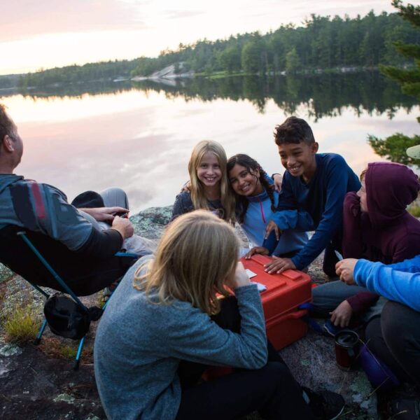 Photo of happy blended family camping, representing dos and don’ts of step-parenting