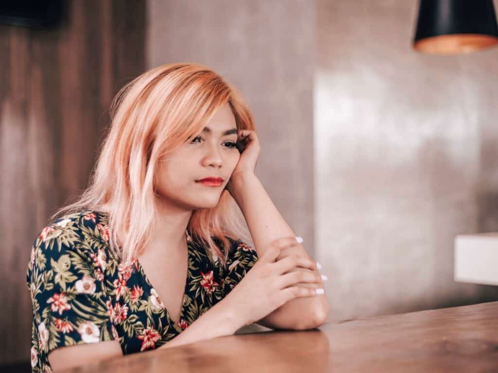 Woman feeling drained because of an emotional vampire