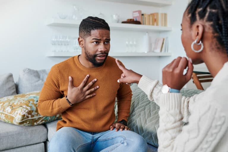 Photo of a couple arguing representing the pursuer-distancer pattern in relationships
