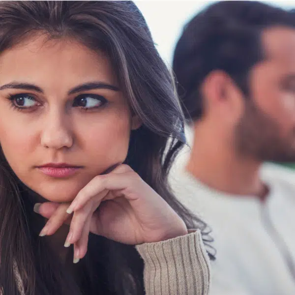 Young couple whose relationship is threatened by Gottman's Four Horsemen of the apocalypse