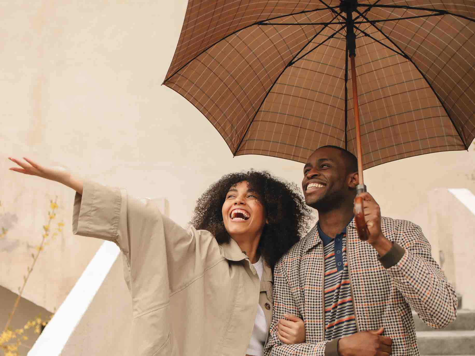 Couple cultivating contentment by making the most of a rainy day