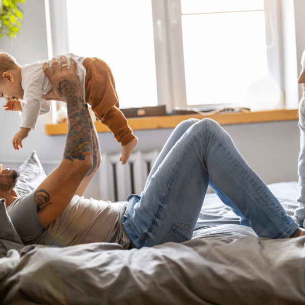 Happy family representing being ready for a baby.