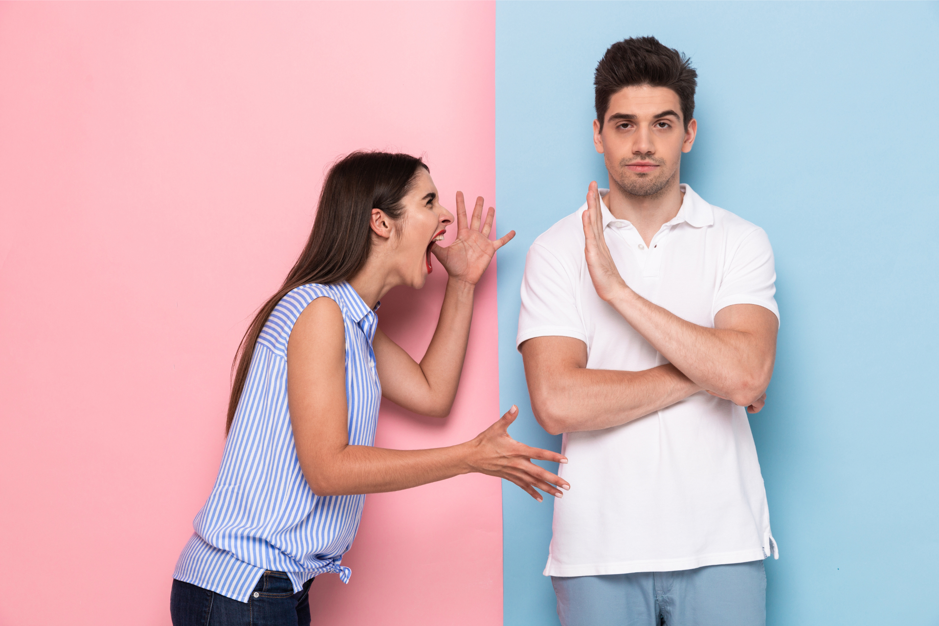 A woman screams at a man who is ignoring her, representing how to connect with an emotionally unavailable partner