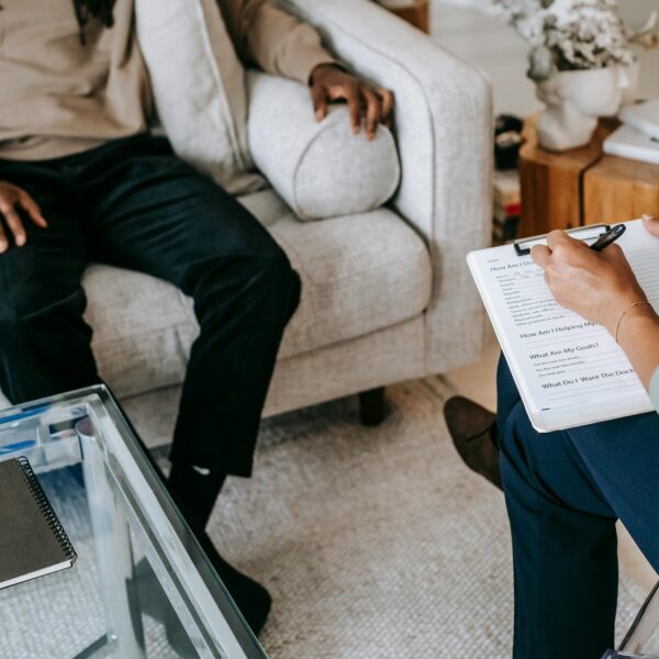 A therapist goes over notes with her client depicting why therapy clients get stuck and what to do about it.
