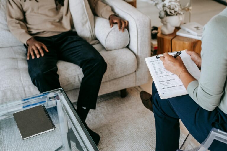 A therapist goes over notes with her client depicting why therapy clients get stuck and what to do about it.