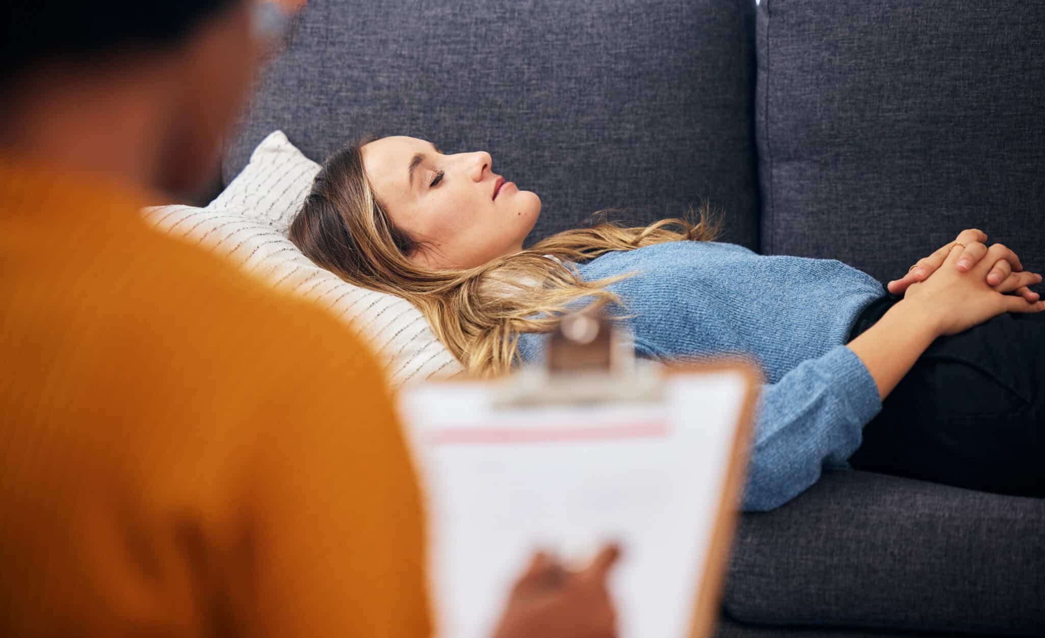 A therapist talks to a woman about her sleep issues representing How Sleep Therapy Can Supercharge Therapy Client Outcomes.