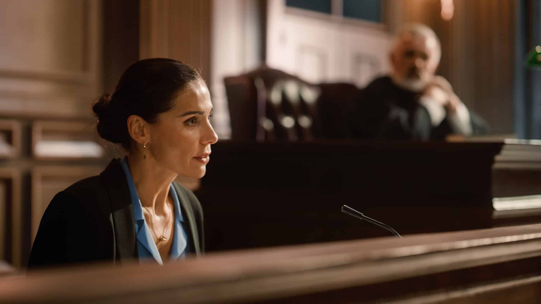 A female therapist on the stand during a trial representing Subpoenaed as a Therapist: How to Stay Legal, Ethical, and Sane.