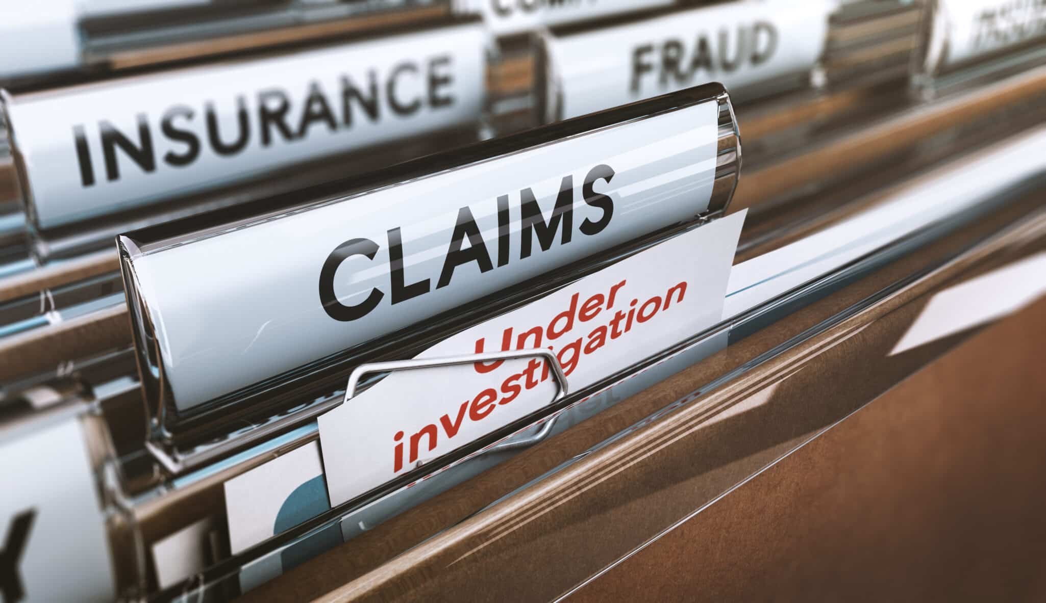A selection of files labeled Insurance, Fraud, and Claims representing Why You’re Probably Committing Therapy Insurance Fraud (And How To Stop)